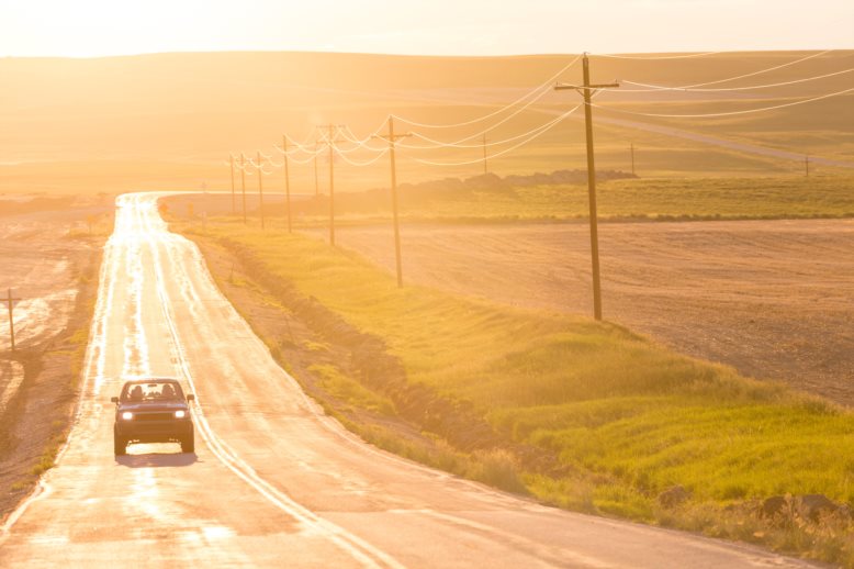 Open road at sunset, Montana, USA